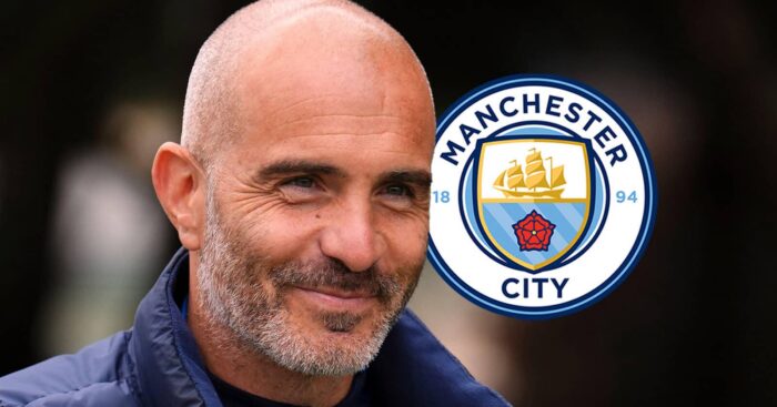 Enzo Maresca with a Man City badge