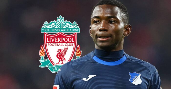 Bazoumana Toure with a Liverpool badge
