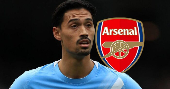 Manchester City star Tijjani Reijnders next to the arsenal badge