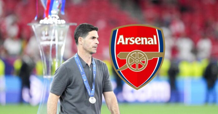 Arsenal manager Mikel Arteta next to the Arsenal badge - copyright TEAMtalk