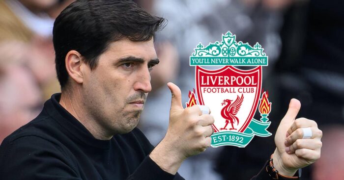 Andoni Iraola gives the double thumbs up as he's seen here next to the Liverpool badge