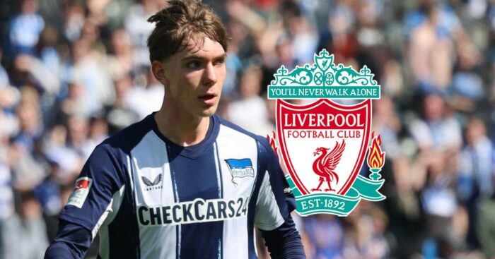Kennet Eichhorn with Liverpool's badge.