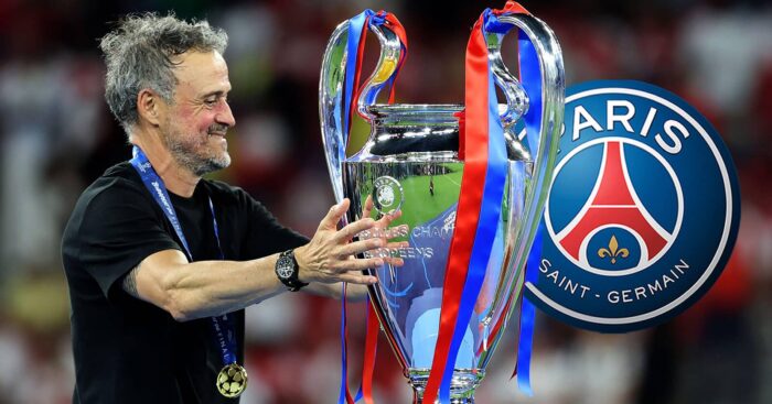 Paris Saint-Germain manager Luis Enrique next to the PSG badge - copyright TEAMtalk
