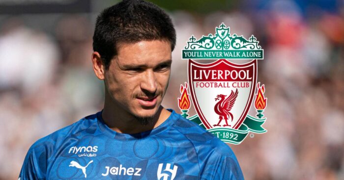 Al-Hilal striker Darwin Nunez next to the badge of his former club Liverpool