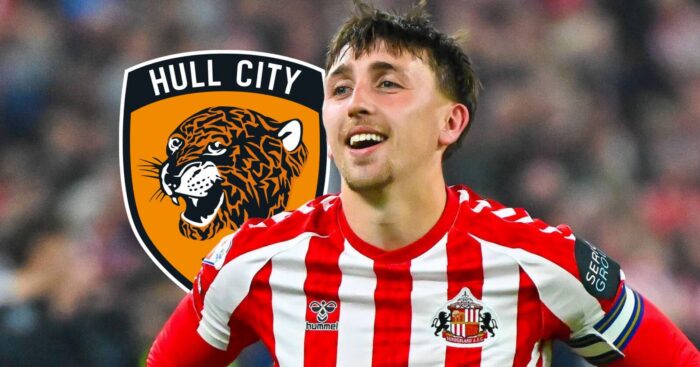 Departing Sunderland captain Dan Neil next to the Hull City badge