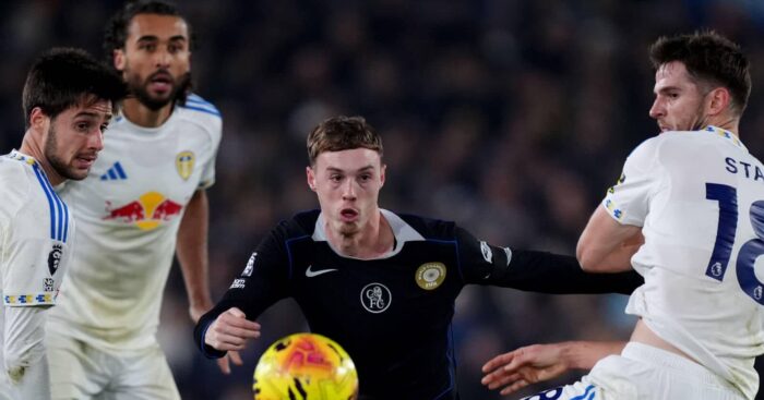 Leeds star Ilia Gruev (left) and teammate Anton Stach (right) keep an eye on Chelsea's Cole Palmer
