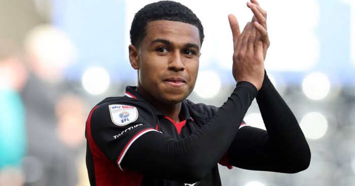 Southampton midfielder Shea Charles claps the travelling fans during a game at Swansea