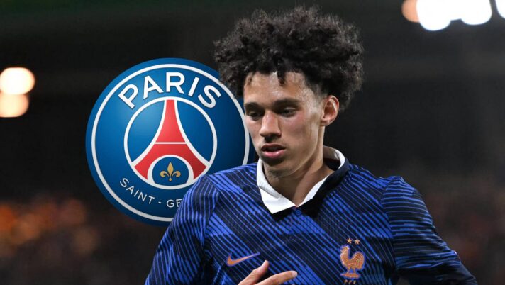 Maghnes Akliouche with a PSG badge