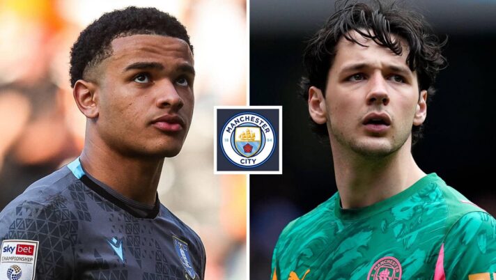 Pierce Charles and James Trafford either side of the Manchester City badge
