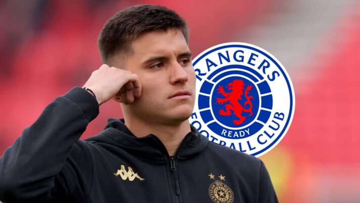 Partizan midfielder Vanja Dragojevic next to the Rangers badge