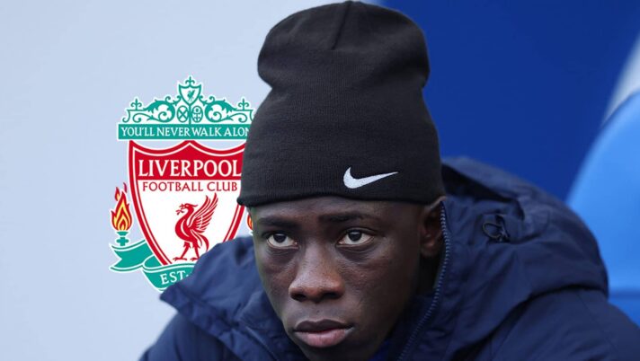 Brighton winger Yankuba Minteh next to the Liverpool badge