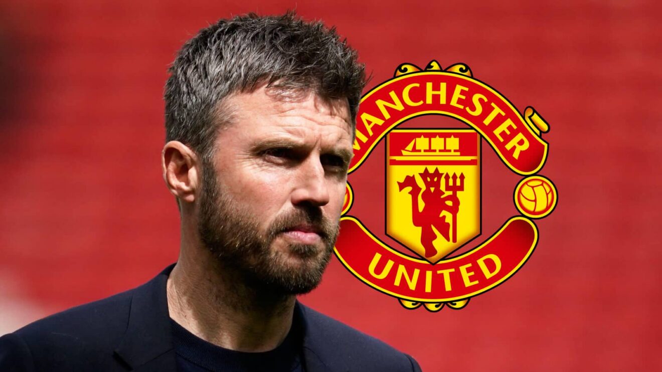 Manchester United boss Michael Carrick next to the club badge