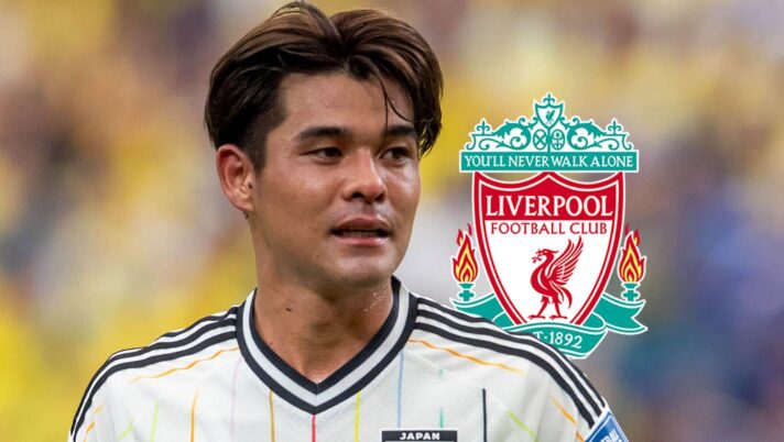 Kaishu Sano with a Liverpool badge