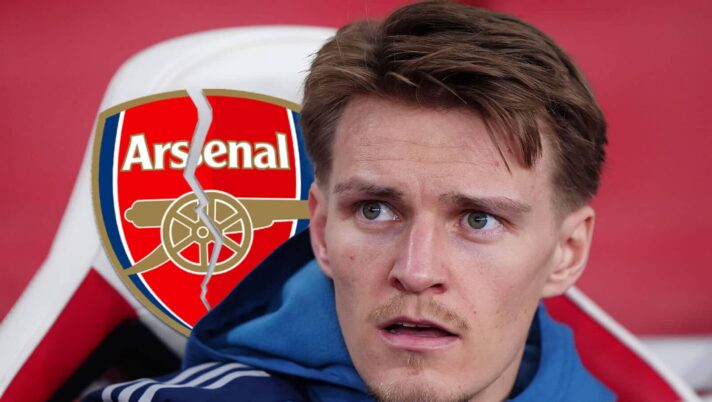 Arsenal captain Martin Odegaard sat on the bench and next to a cracked Arsenal badge