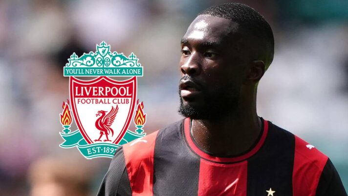 Fikayo Tomori next to a Liverpool badge
