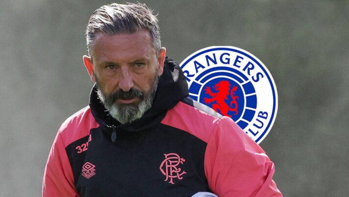 Rangers boss Derek McInnes next to the club badge