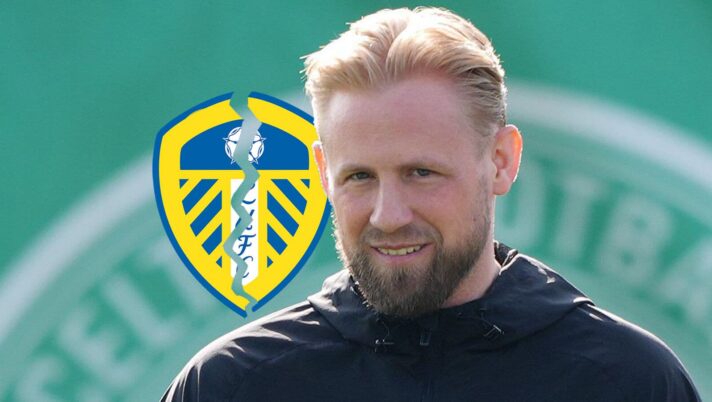 Former goalkeeper Kasper Schmeichel with a broken Leeds United badge
