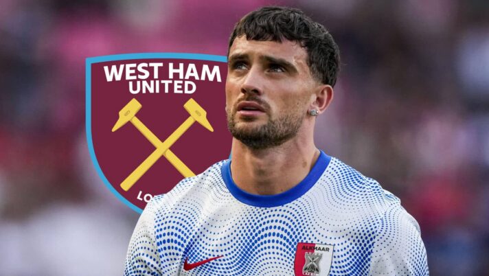 Troy Parrott with West Ham badge