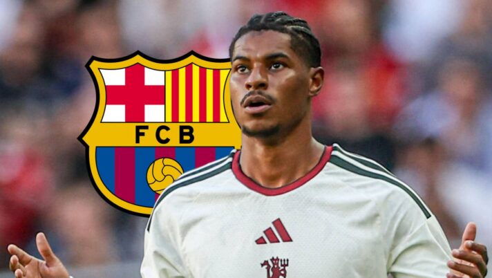 Marcus Rashford with a Barcelona badge