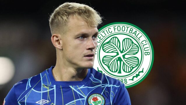 Blackburn Rovers star Balazs Toth with a Celtic badge