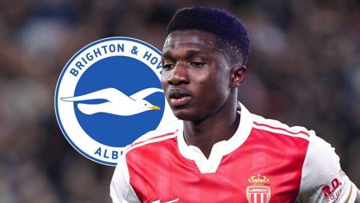 Lamine Camara with a Brighton badge