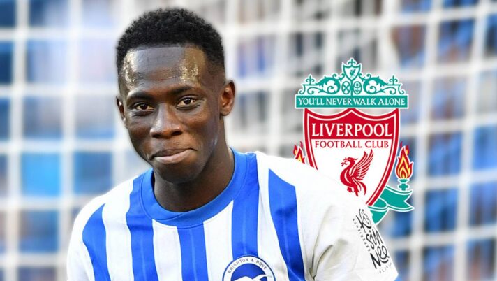 Brighton winger Yankuba Minteh next to the Liverpool badge