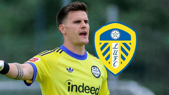 Eintracht Frankfurt goalkeeper Michael Zetterer next to the Leeds United badge