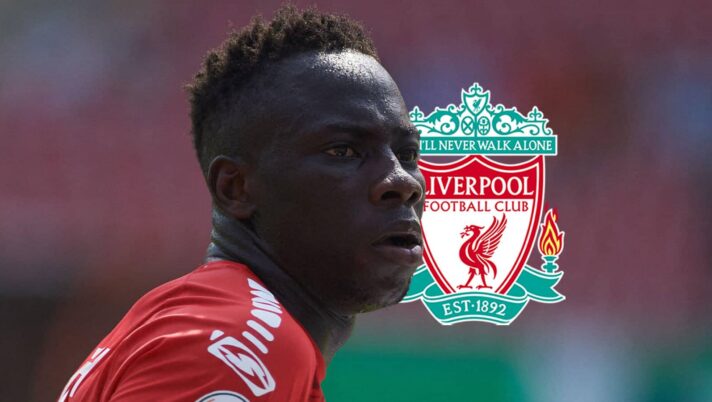 Brighton star Yankuba Minteh next to the Liverpool badge