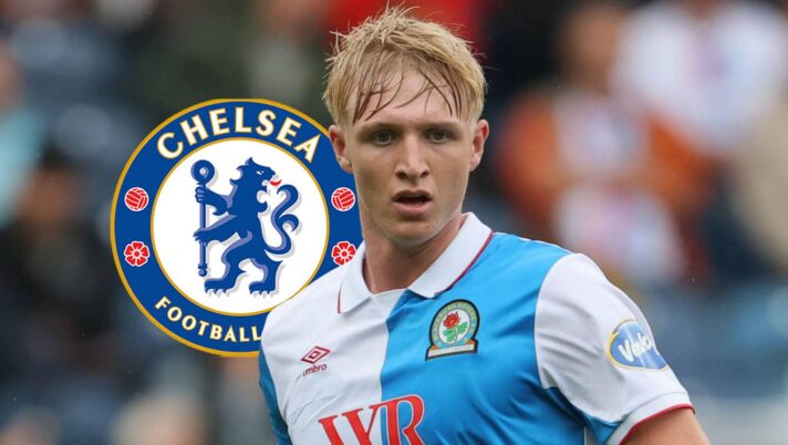 Blackburn star Tom Atcheson with a Chelsea badge