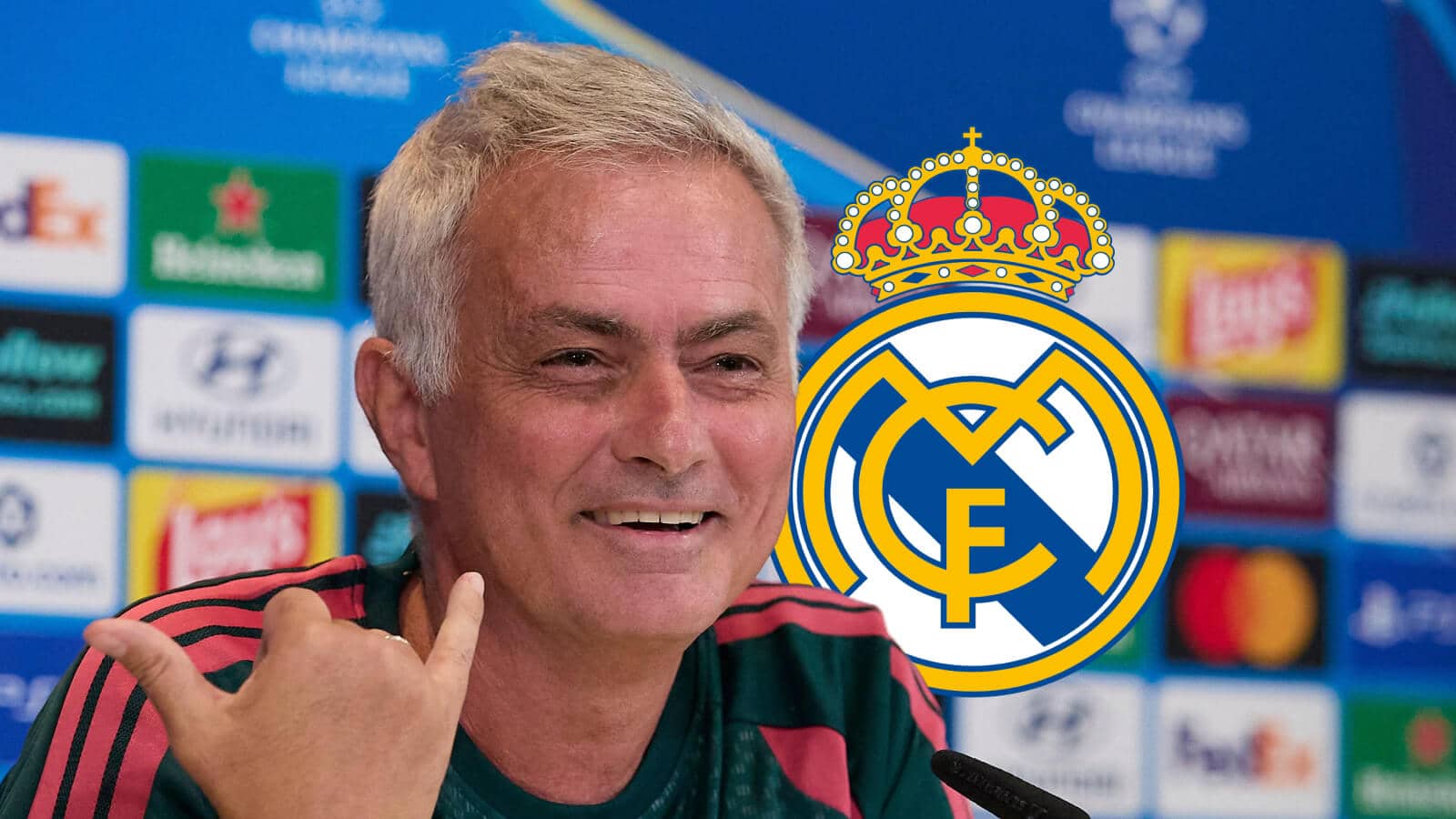 Jose Mourinho next to the Real Madrid badge
