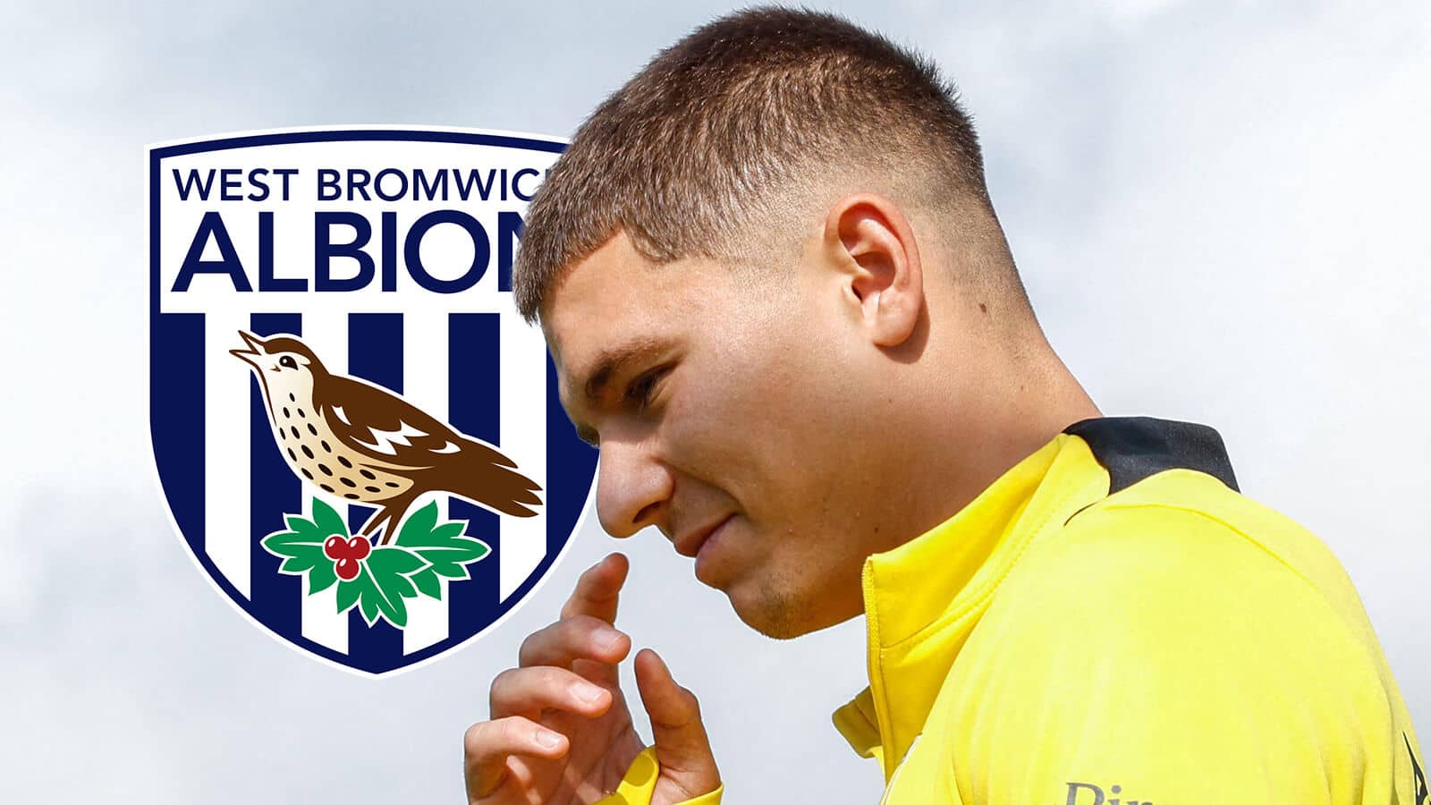 AEK Athens star Dimitris Kaloskamis with a West Brom badge