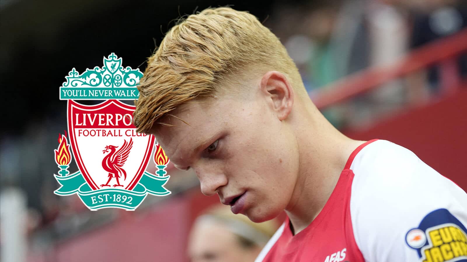 AZ Alkmaar star Kees Smit next to the Liverpool badge