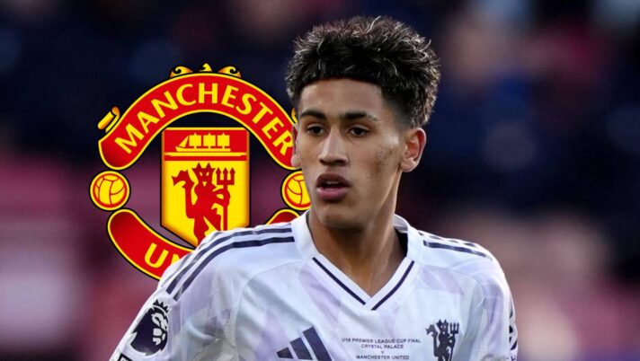 Manchester United's JJ Gabriel next to the club badge