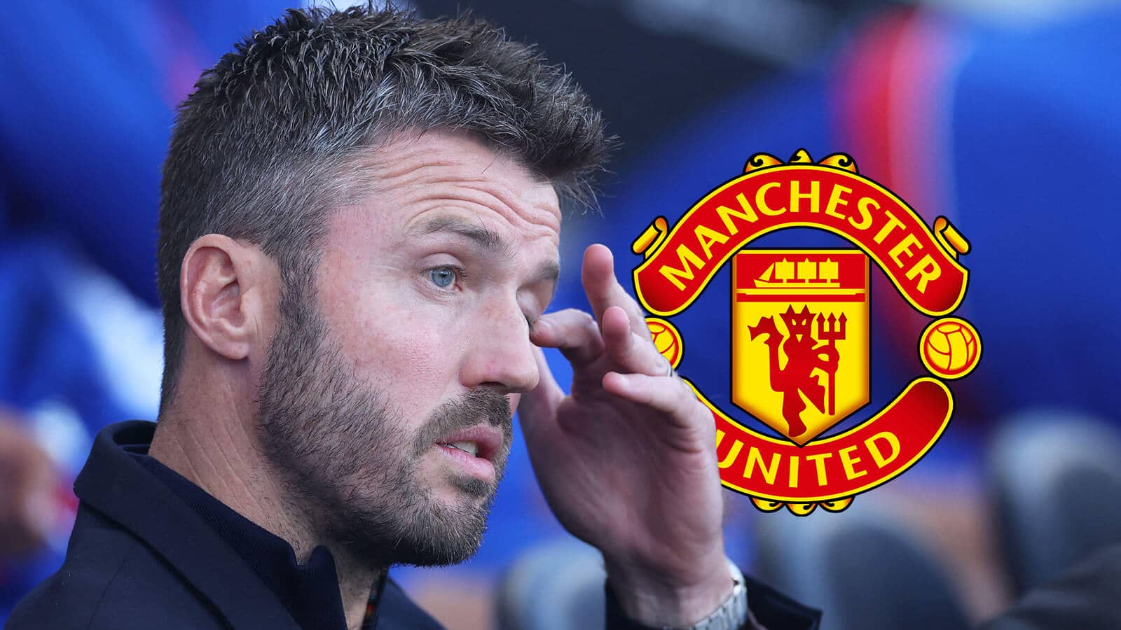 Manchester United manager Michael Carrick next to the club badge