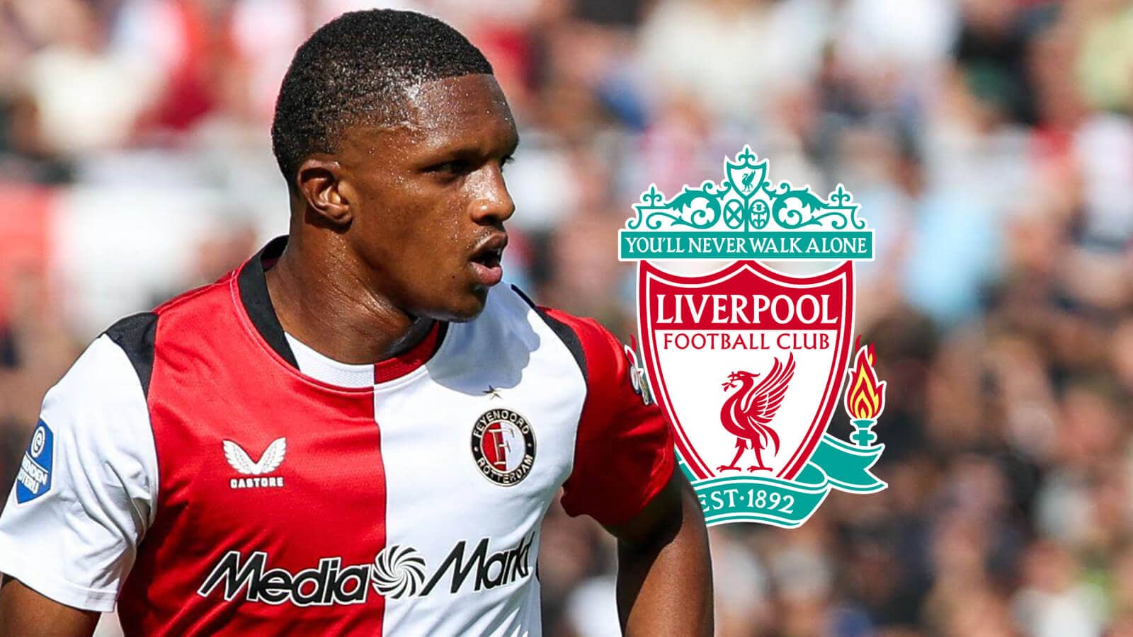 Feyenoord star Givairo Read with a Liverpool badge