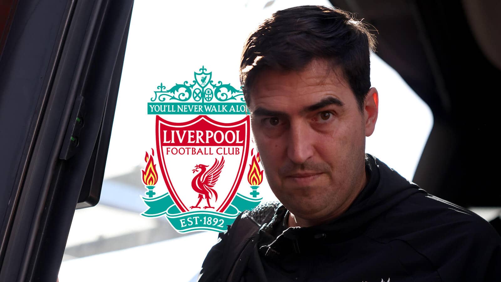 Liverpool boss Andoni Iraola steps off the club's coach and is pictured next to the club badge