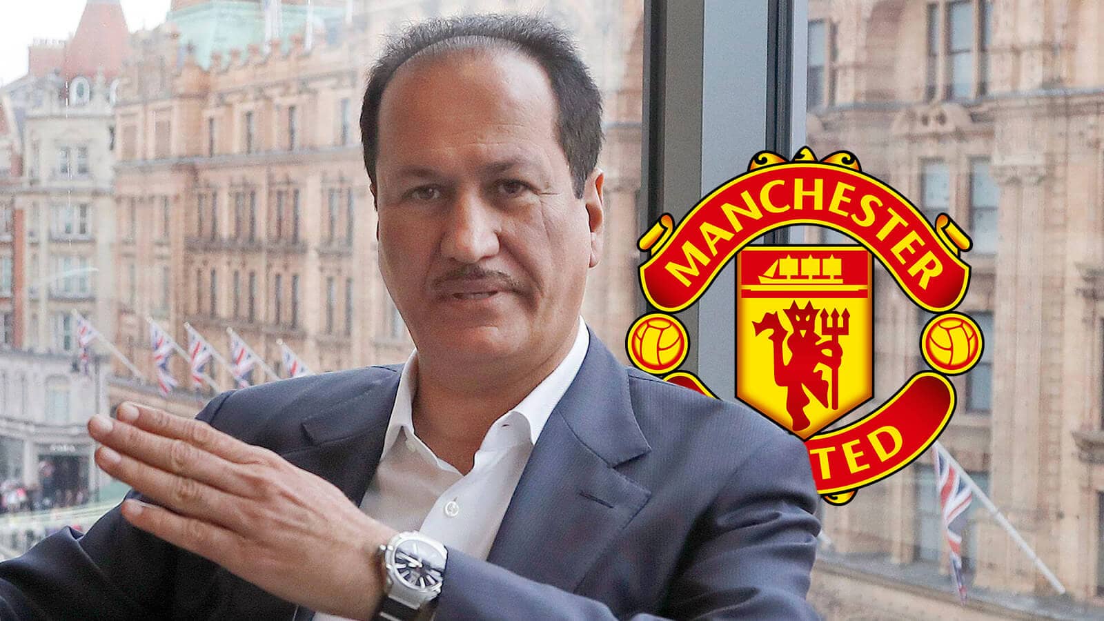 Emirati billionaire businessman Hussain Sajwani with the Manchester United badge next to him - copyright TEAMtalk