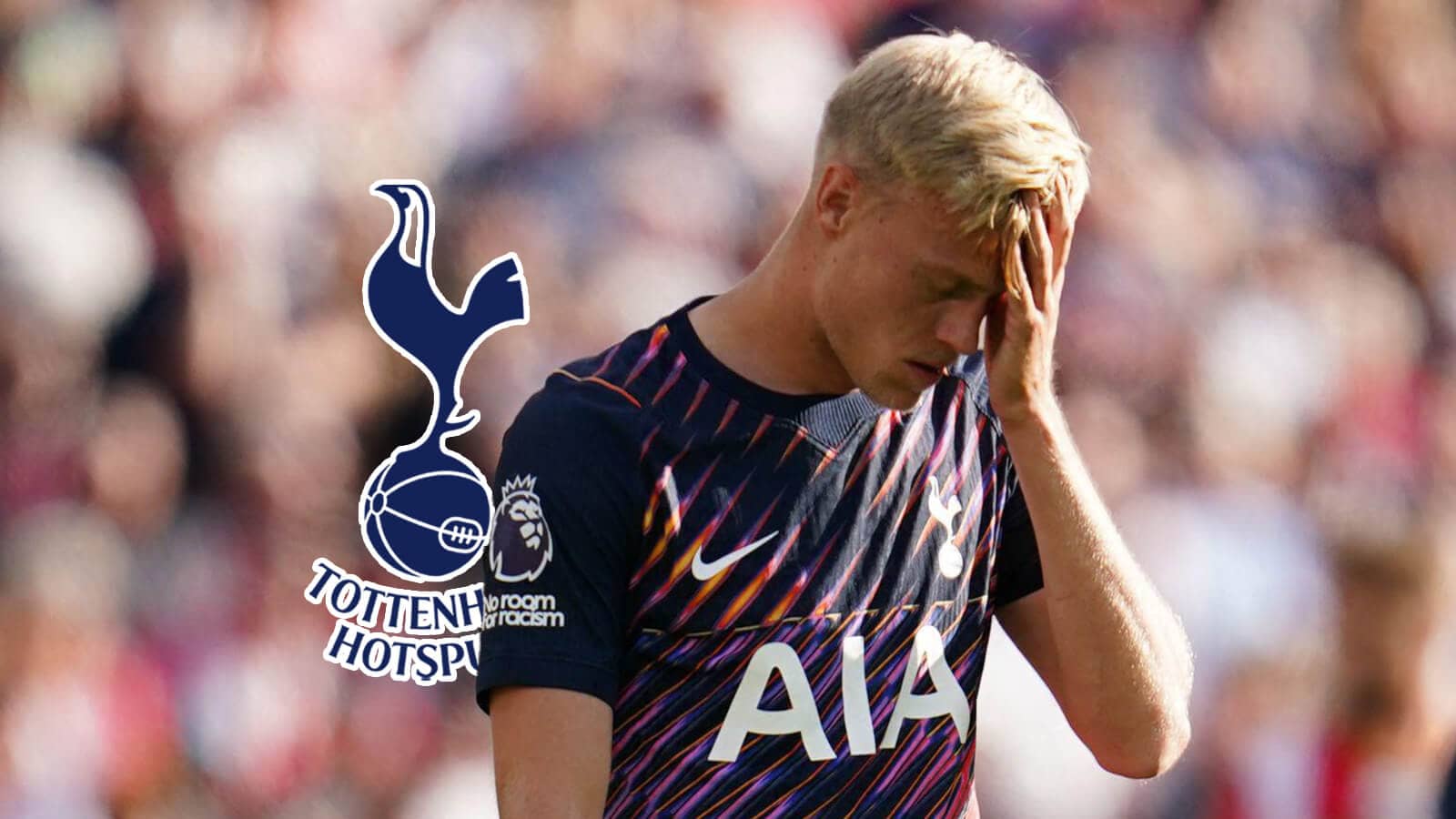 Jan Paul van Hecke with Tottenham badge