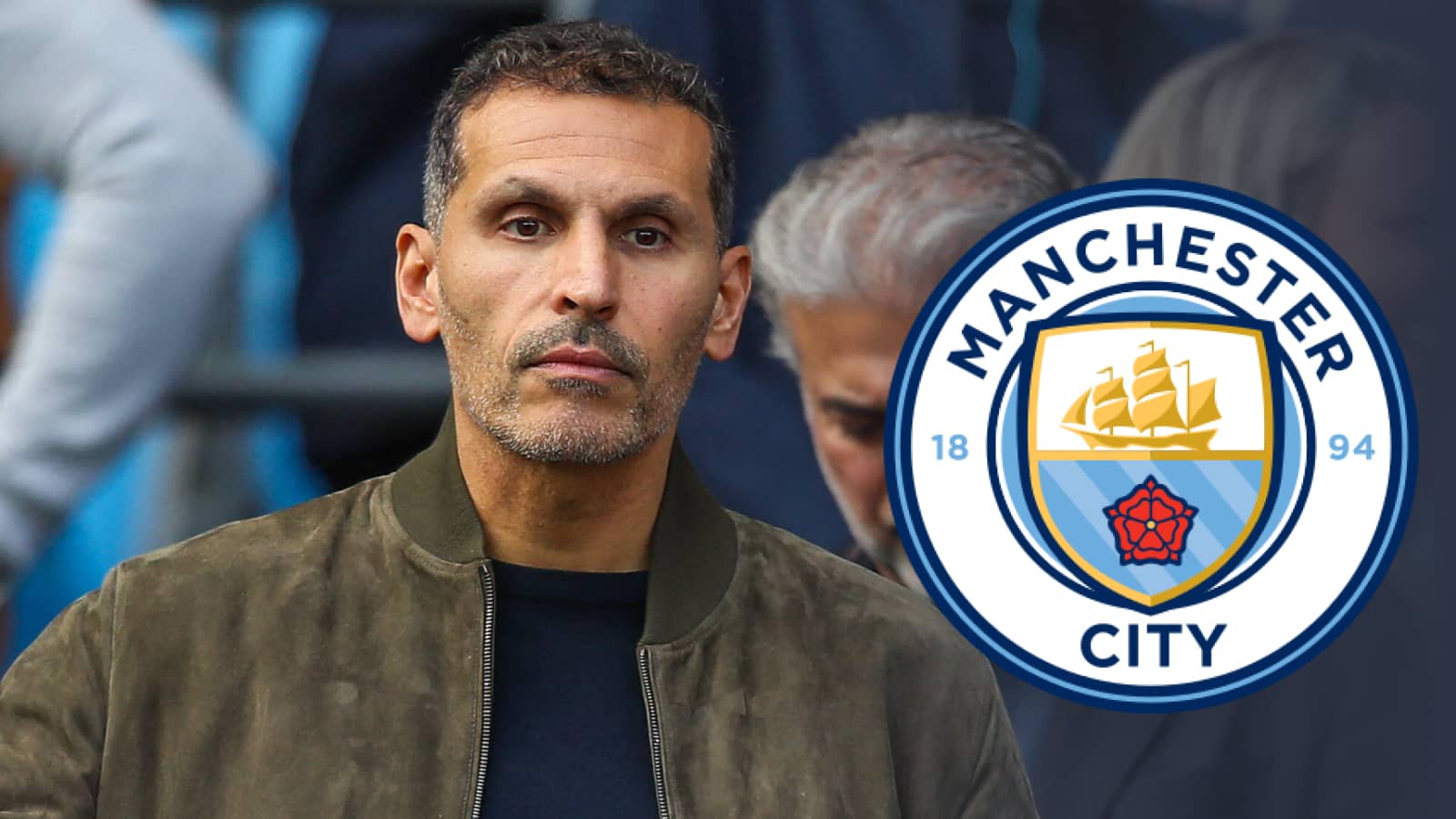 Khaldoon Al Mubarak with Man City badge