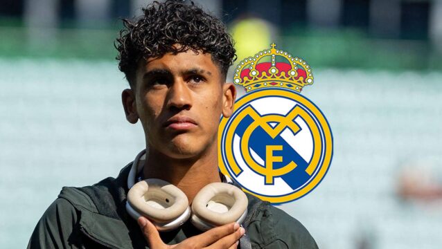 Manchester United's JJ Gabriel next to the Real Madrid badge