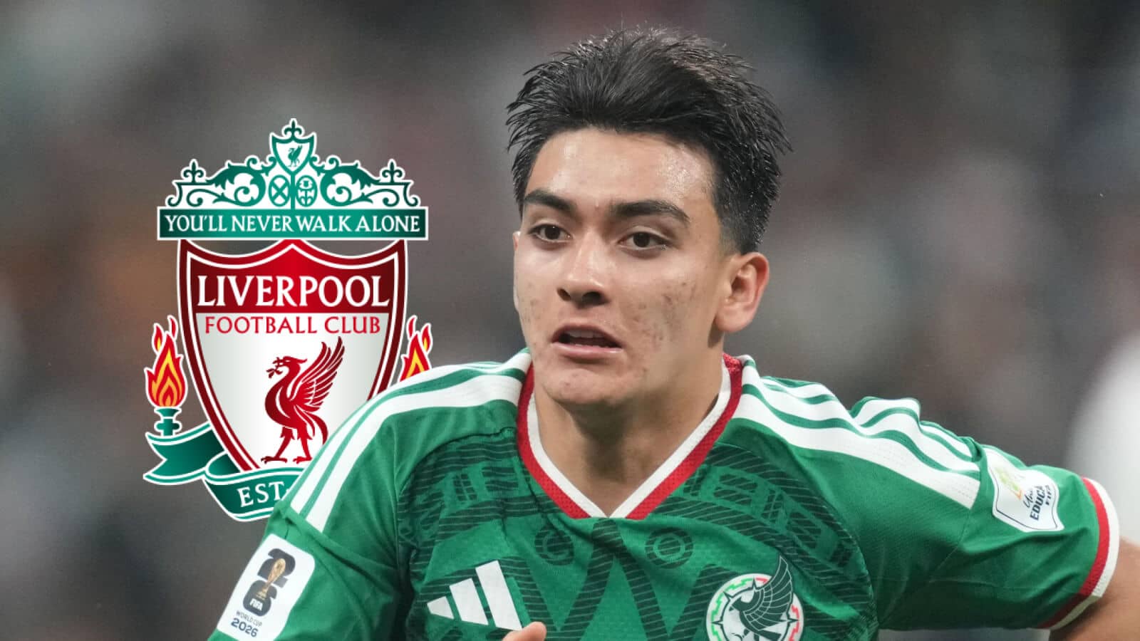 Gilberto Mora with a Liverpool badge