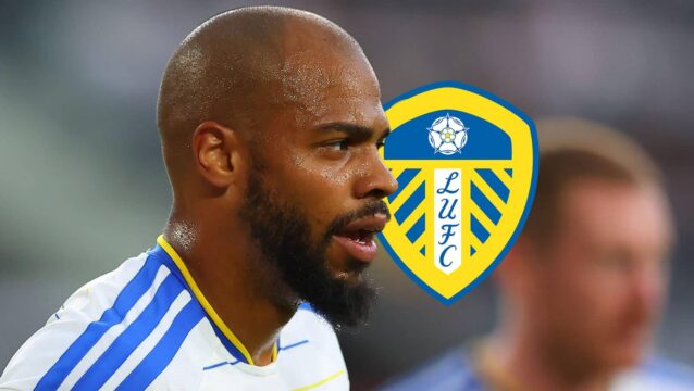 Leeds striker Lukas Nmecha next to the club badge