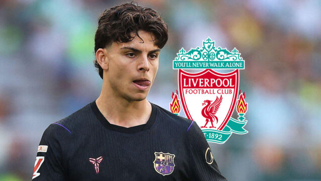 Barcelona star Xavi Espart with a Liverpool badge