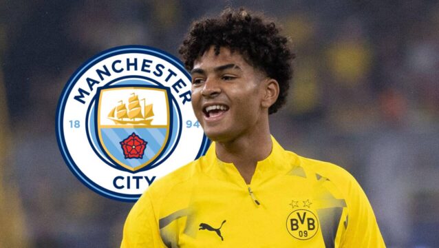 Borussia Dortmund star Mathis Albert with a Man City badge